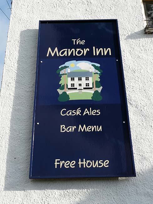 the manor inn pub sign
