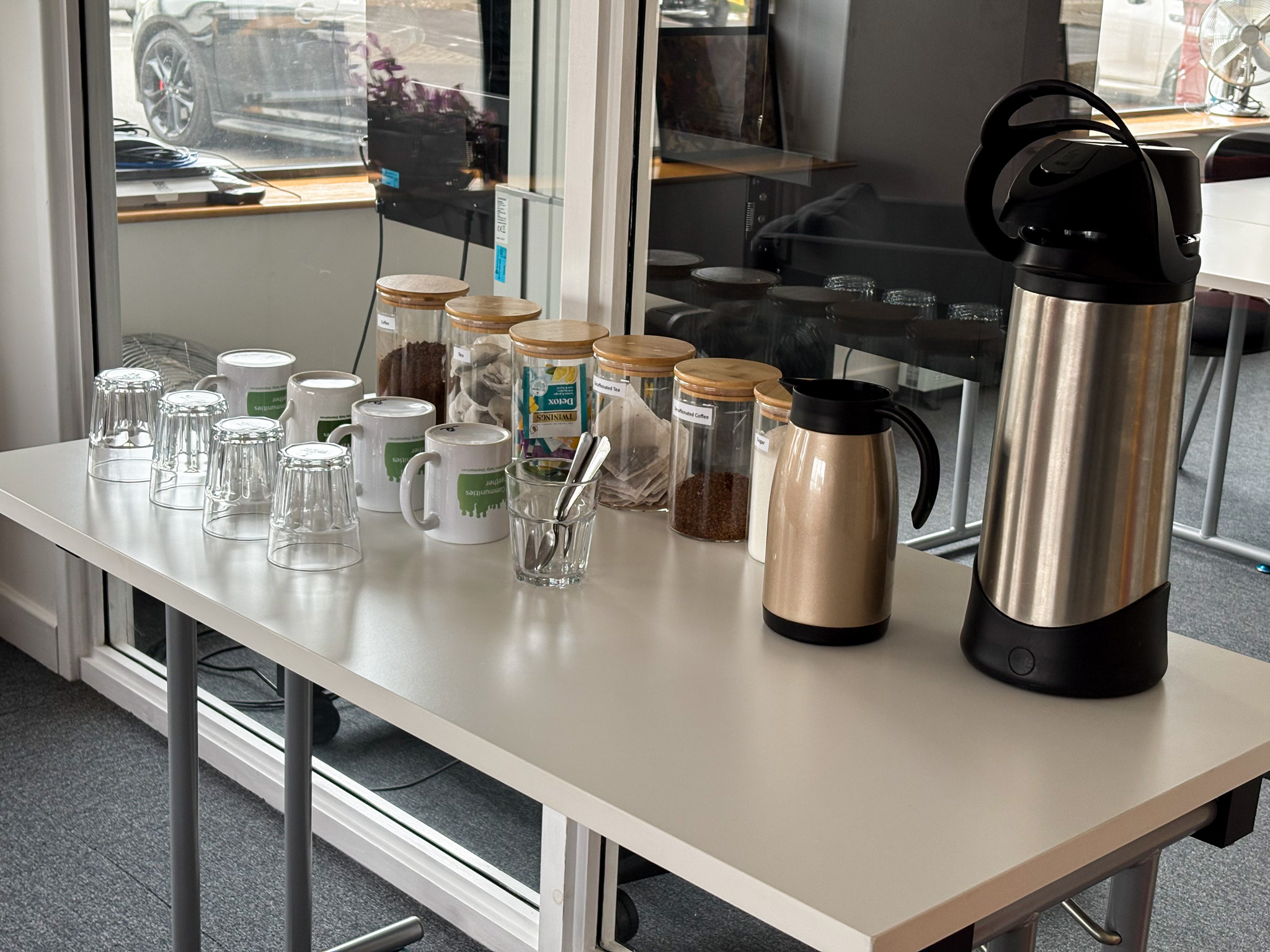 tea and coffee facilities with empty glasses 