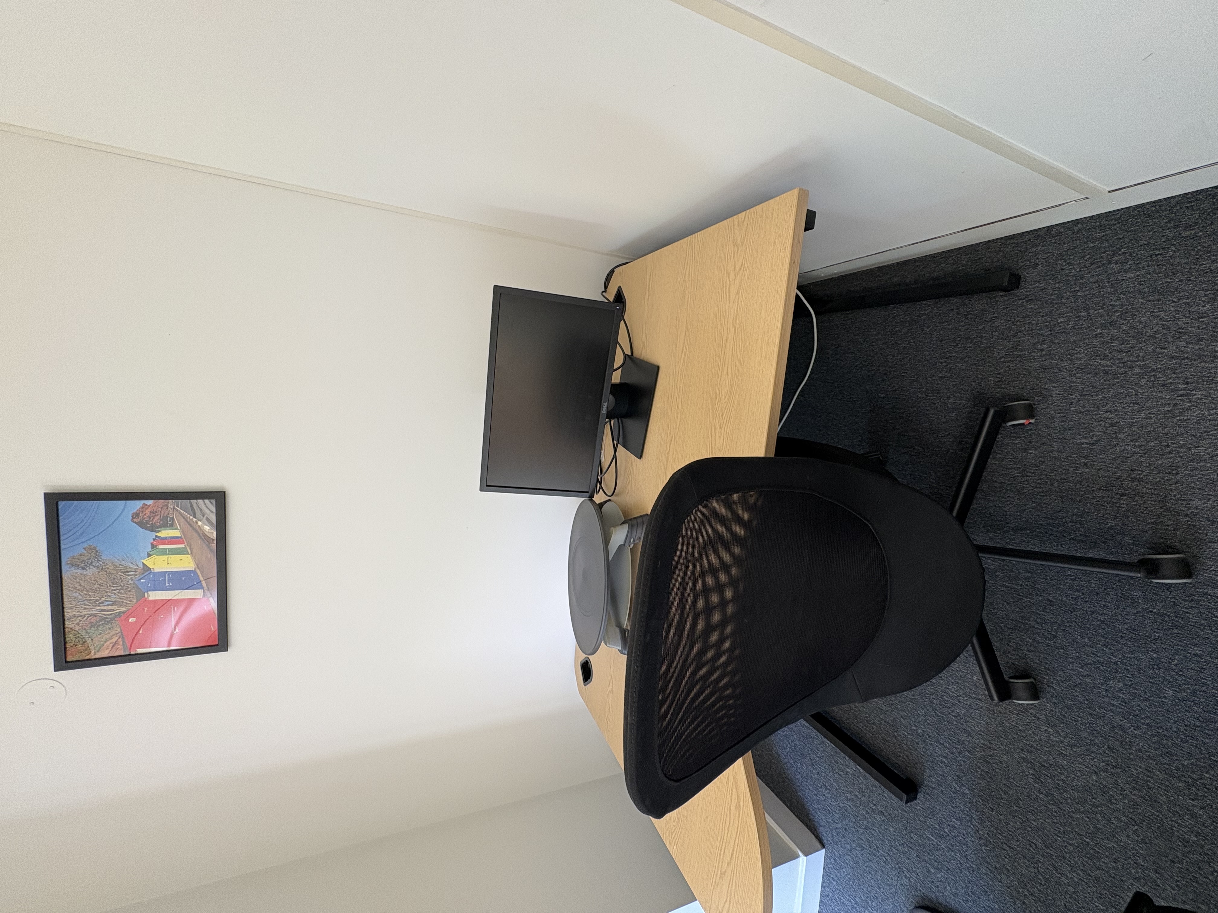 Desk with PC screen and chair