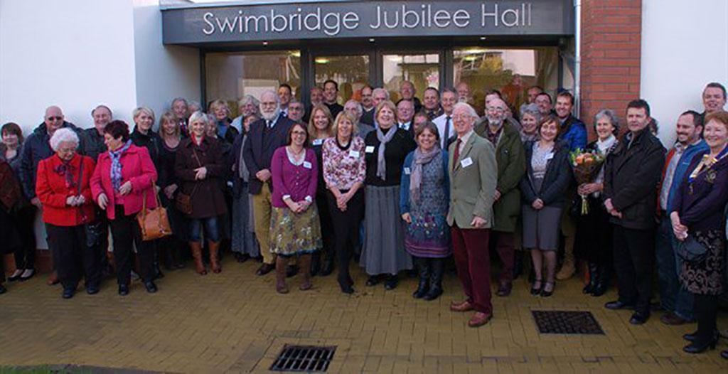 People standing outside Swimbridge village hall
