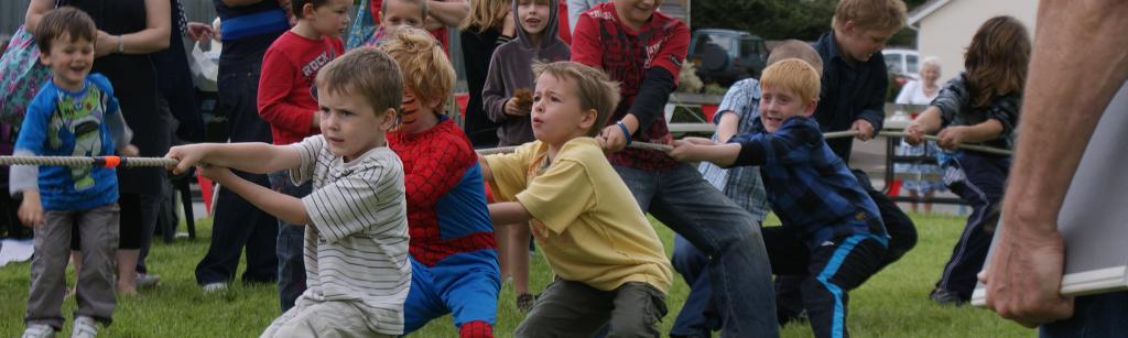 Children competing at tug-of-war