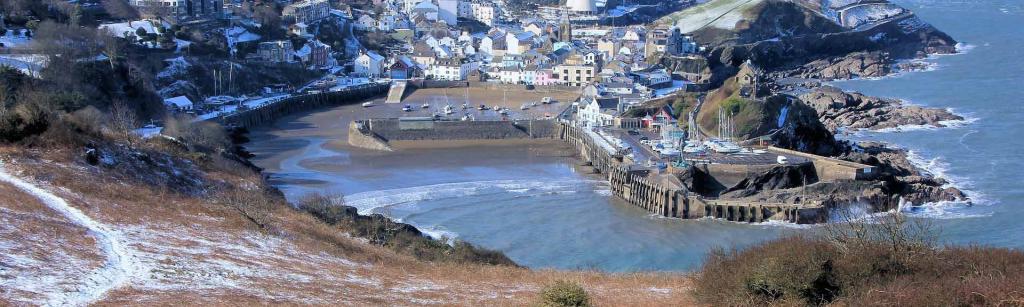 Snow covered ilfracombe bay shot from above