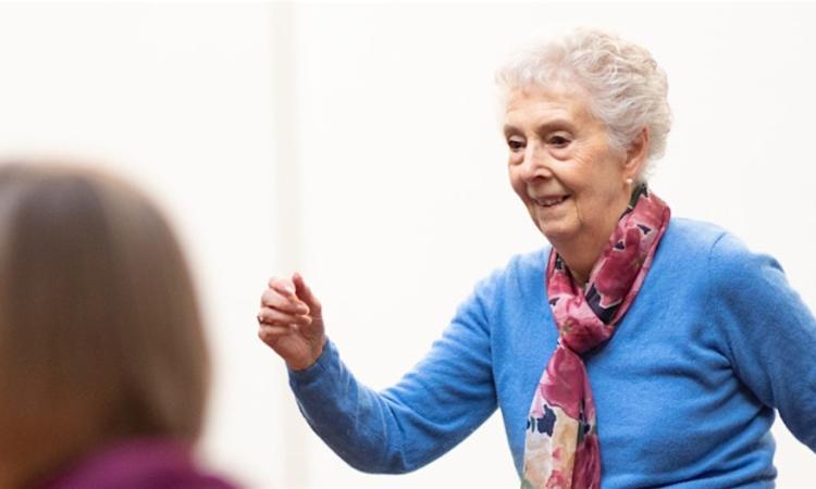 Older lady looking active and smiling