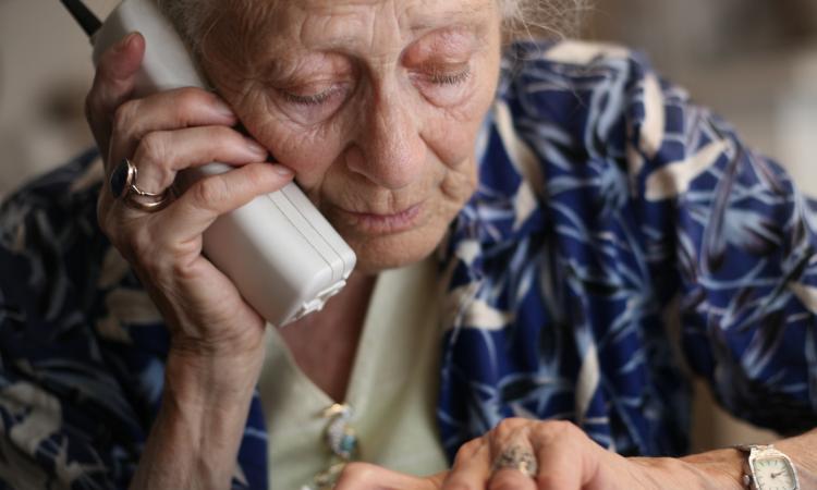 Elderly lady with telephone