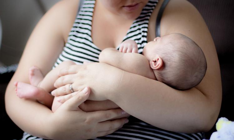 Baby in mother's arms