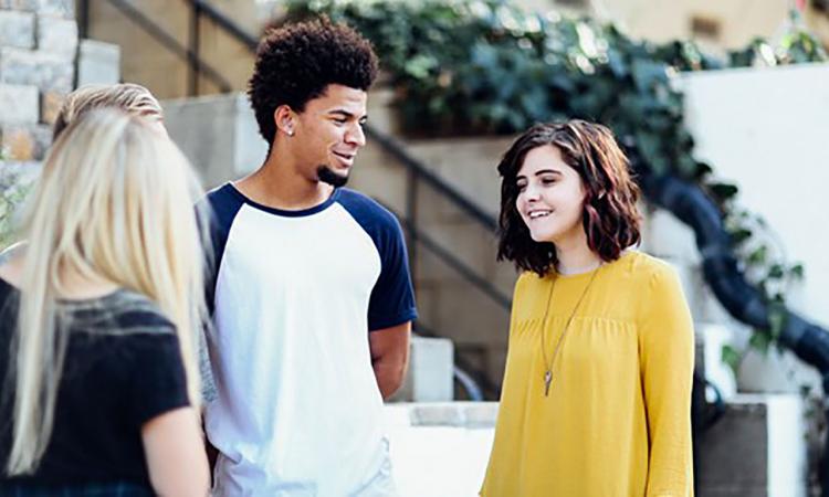 Conversation between two girls and a boy