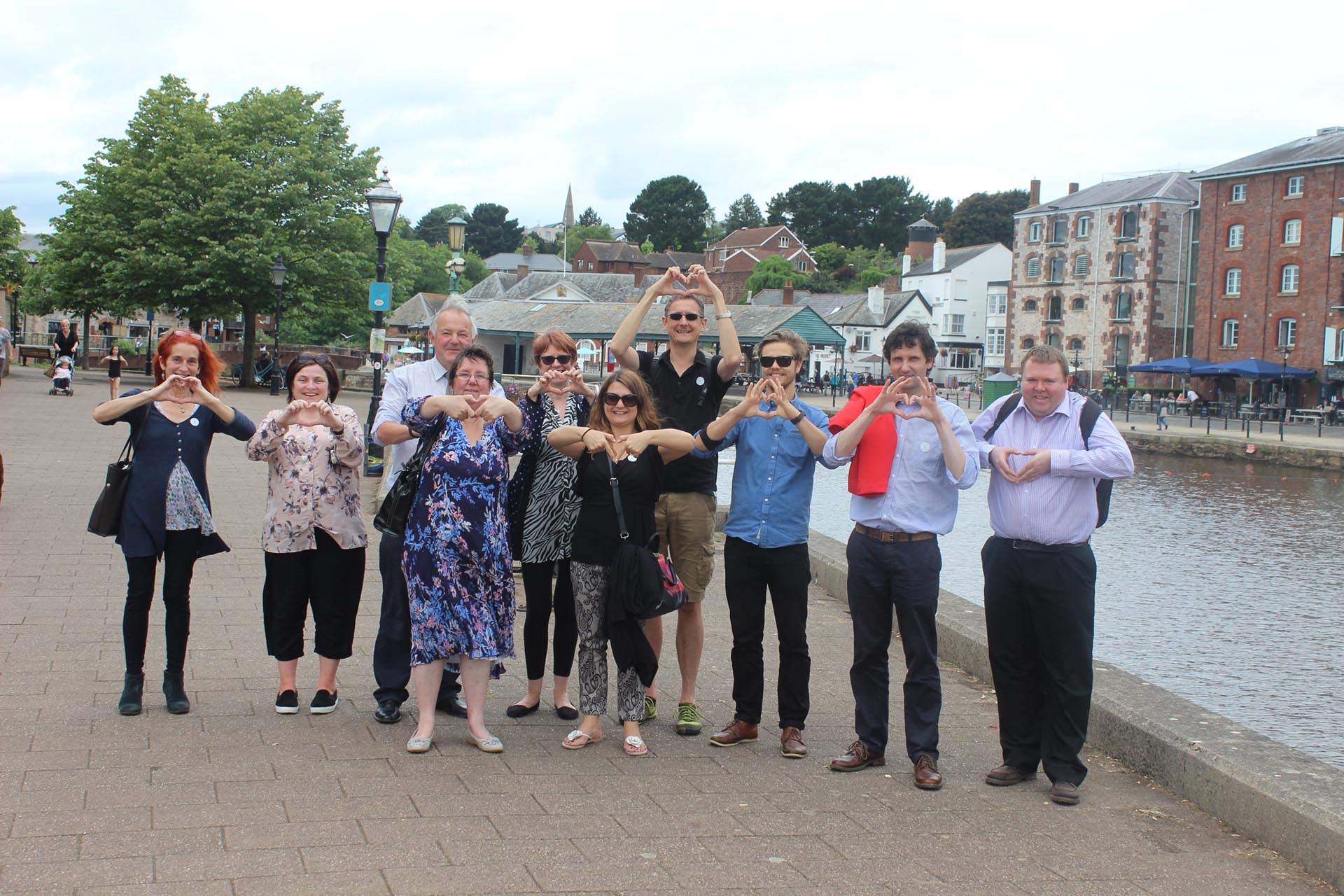 DCT team LOVE Devon hand sign