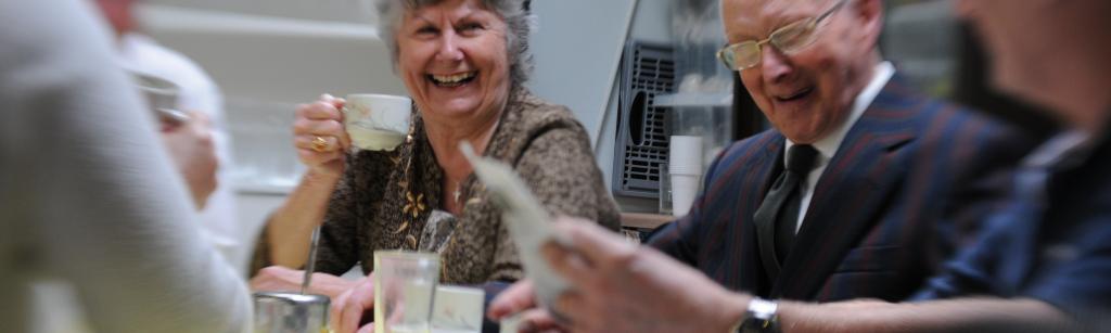 Older people around a table