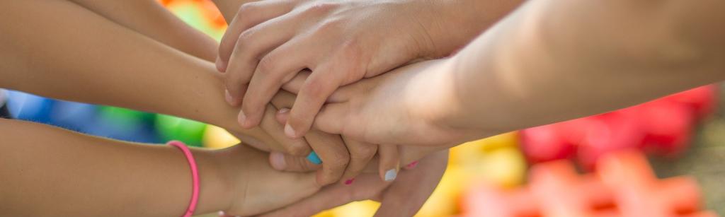 People placing hands together