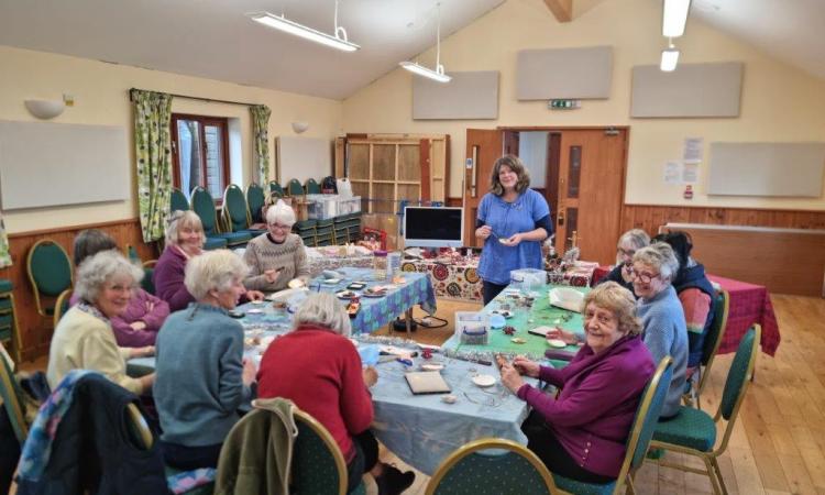 Umborne Village Hall craft club group round a table