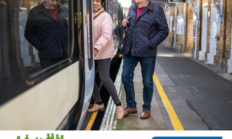 people standing by a train